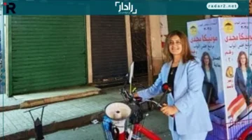 الدراجة الانتخابية.. مونيكا مجدي تخطف الأنظار بشوارع شبرا لدعم حملتها لمجلس النواب